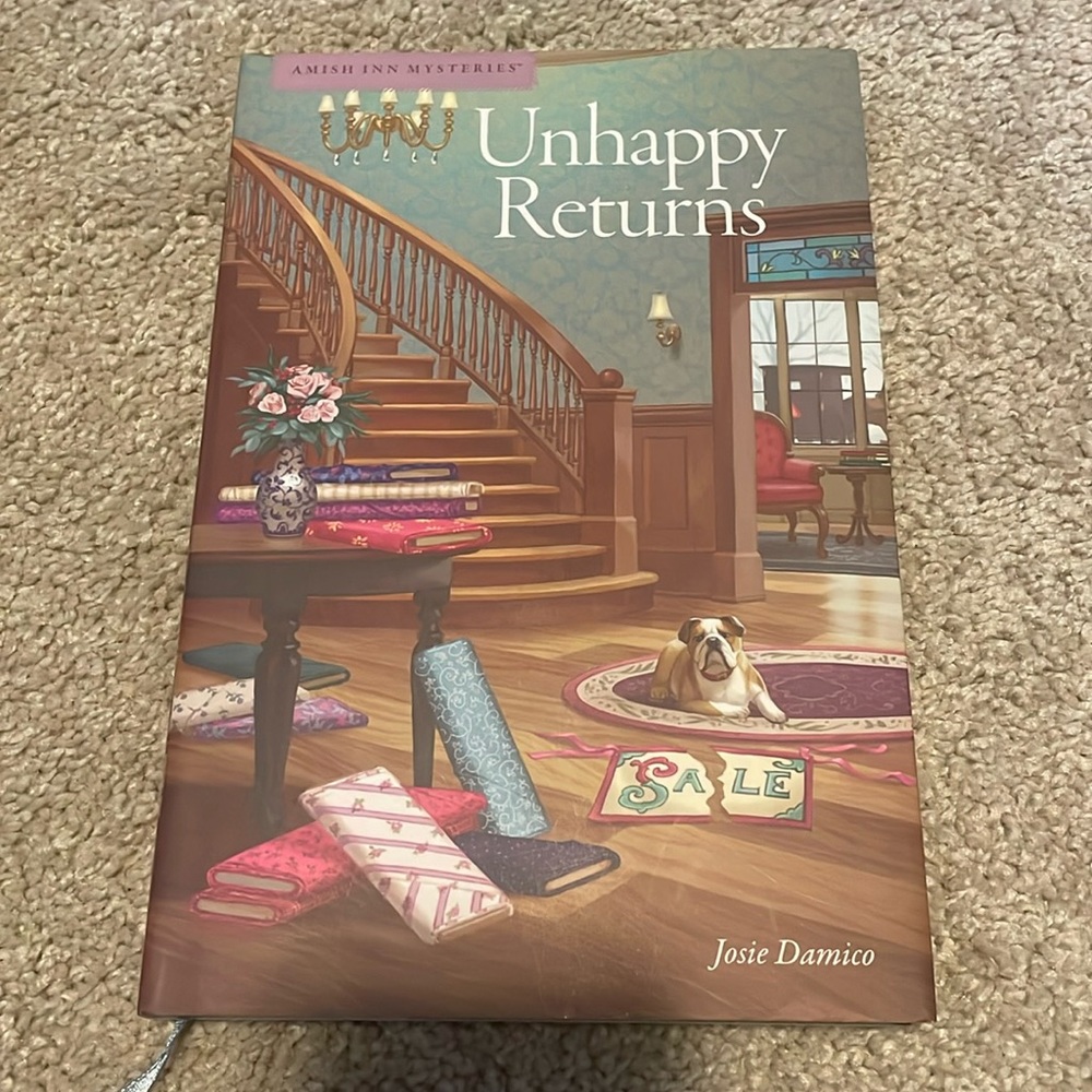Unhappy returns, hardcover by Josie Damico.